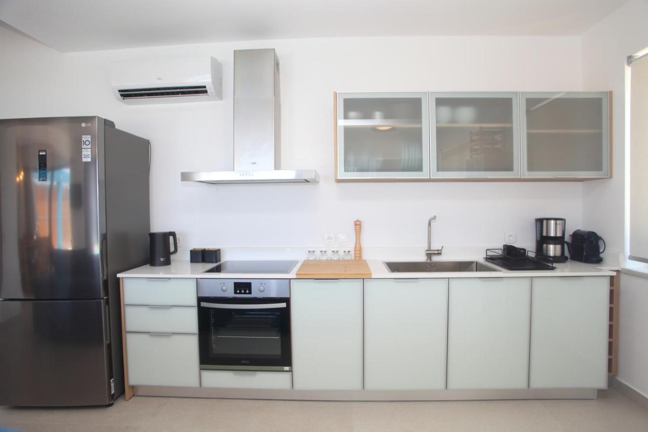 Capro - Milos Bay Villas Ayios Nikitas Ngoại thất bức ảnh